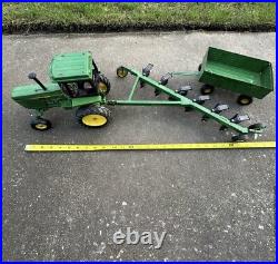 VTG Ertl Co. John Deere Dyersville, lowa USA 52040 with6 bottom plow and trailer