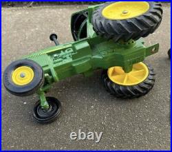 VTG Ertl Co. John Deere Dyersville, lowa USA 52040 with6 bottom plow and trailer