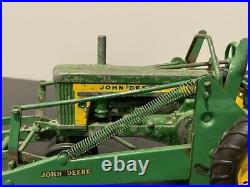 Vintage ERTL ESKA John Deere 620 Tractor, 3 point hitch, loader, 4 bottom plow